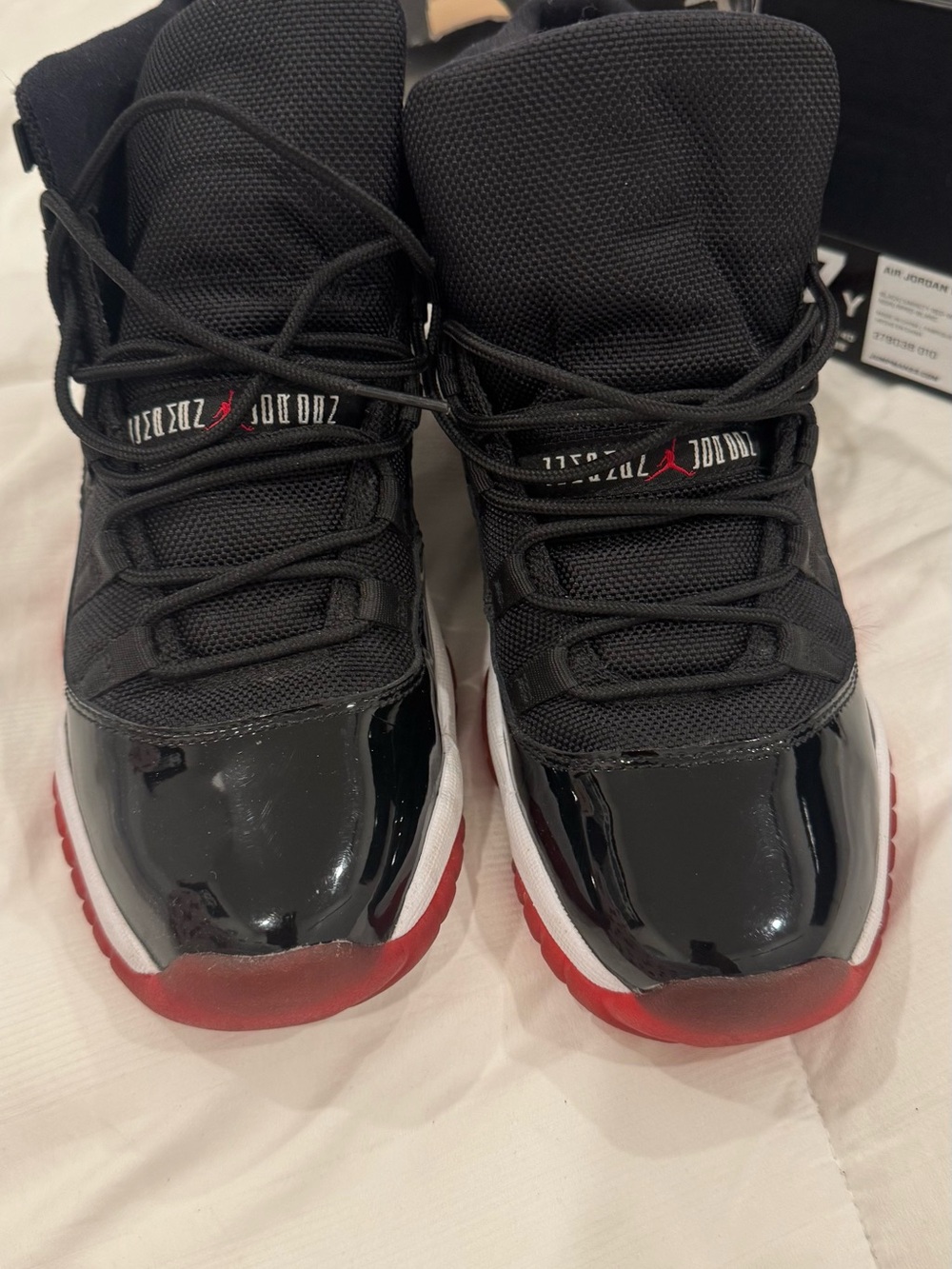 Air Jordan 11 Retro (GS) Black and Red High-Top Sneakers